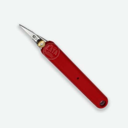 coltello con manico rosso su sfondo grigio